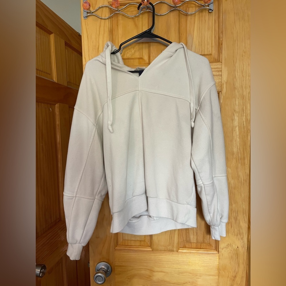 Size medium white sweater. Very comfy.